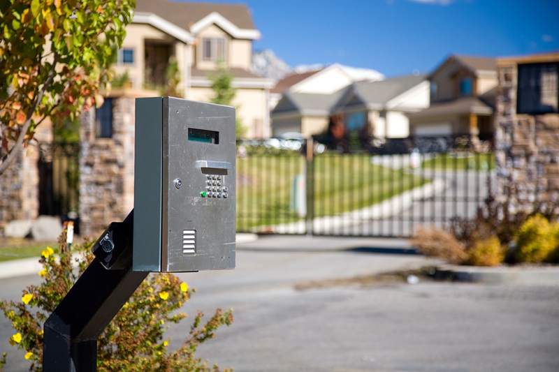 A call box outside of a gated community.