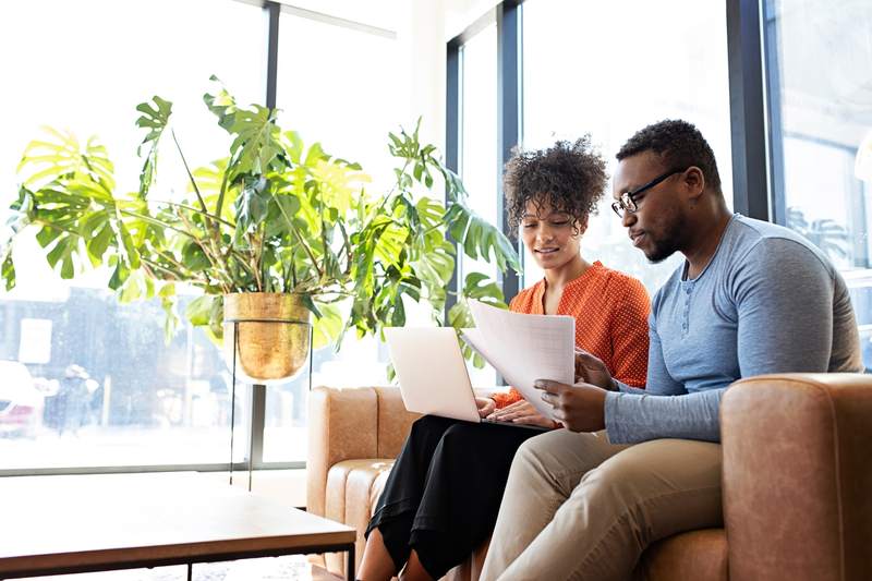 A couple reviews their home equity and investments.