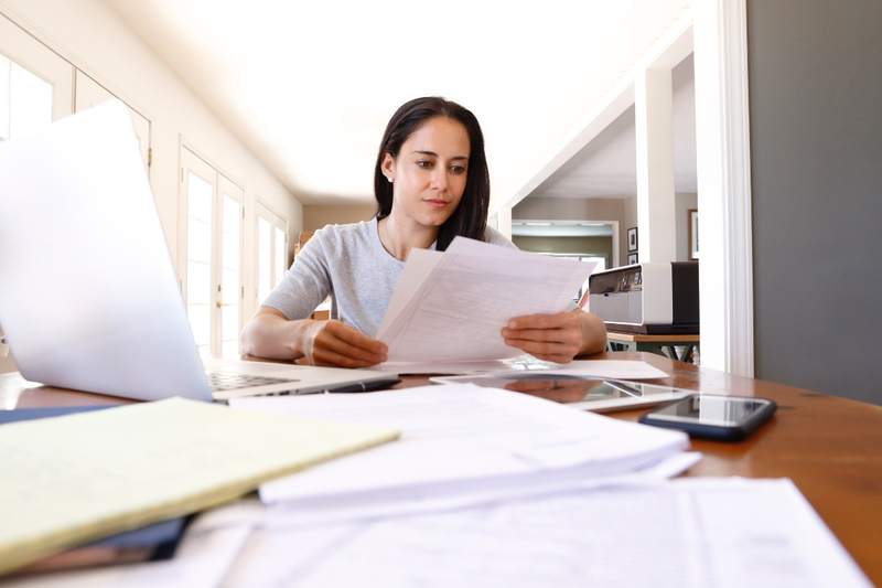 A homeowner checks her mortgage principal.